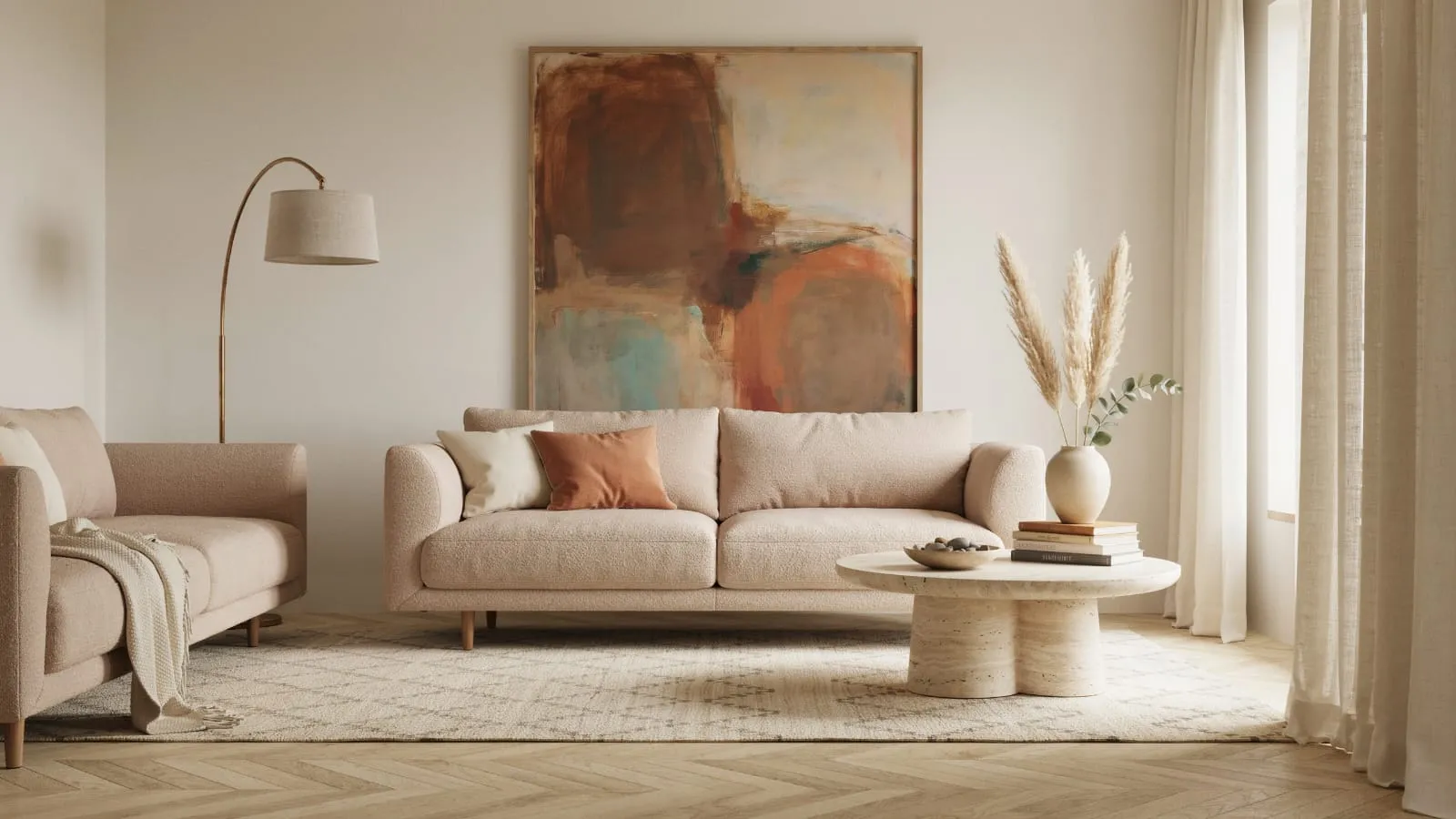Living room wall decor with large abstract artwork, sofa, and neutral furnishings